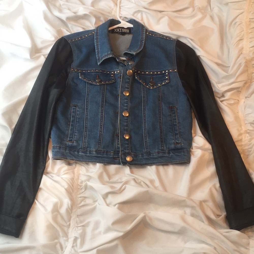 Denim jacket with leather sleeves
